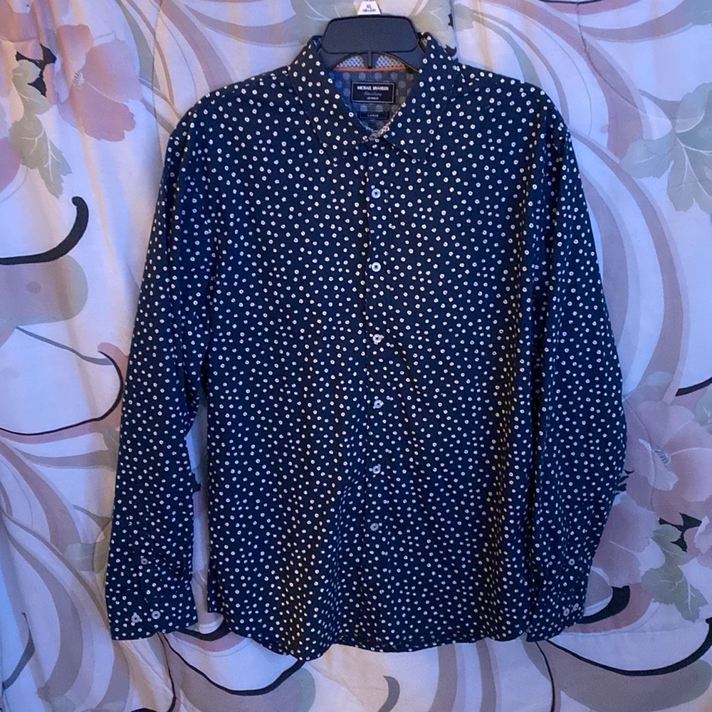A long sleeve collared shirt. Barely worn